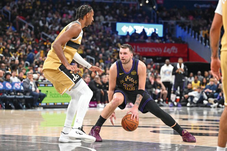 東契奇對陣奇才狂攬37分11板13助攻，刷新多項紀錄。路透社