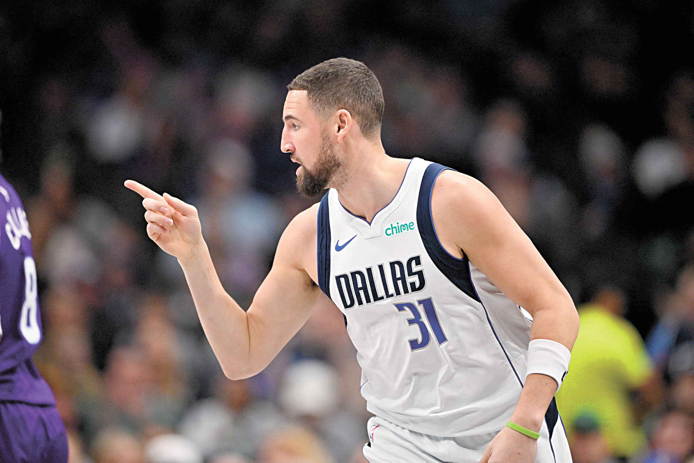 湯普森在對陣爵士隊的比賽中投進三分後慶祝。路透社