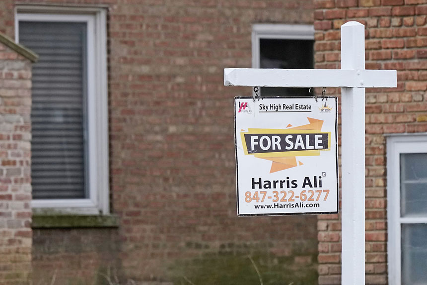 房貸利率降至近三年新低。美聯社