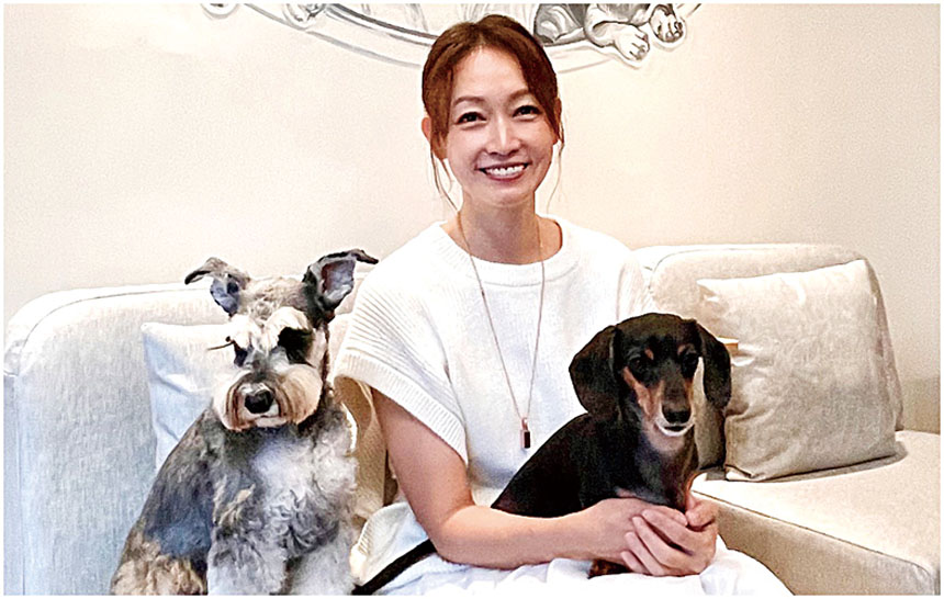 潘慧如和寵物合影。網上圖片