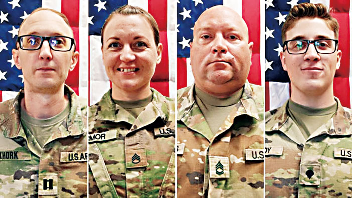 由左至右:霍克上尉、阿摩一級中士、提特珍斯一級中士和科迪中士。美國陸軍