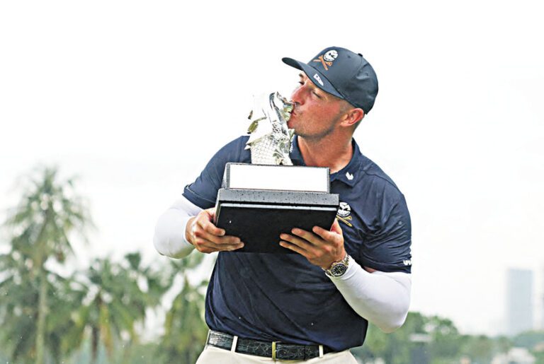 德尚博加冕LIV新加坡站冠軍。路透社