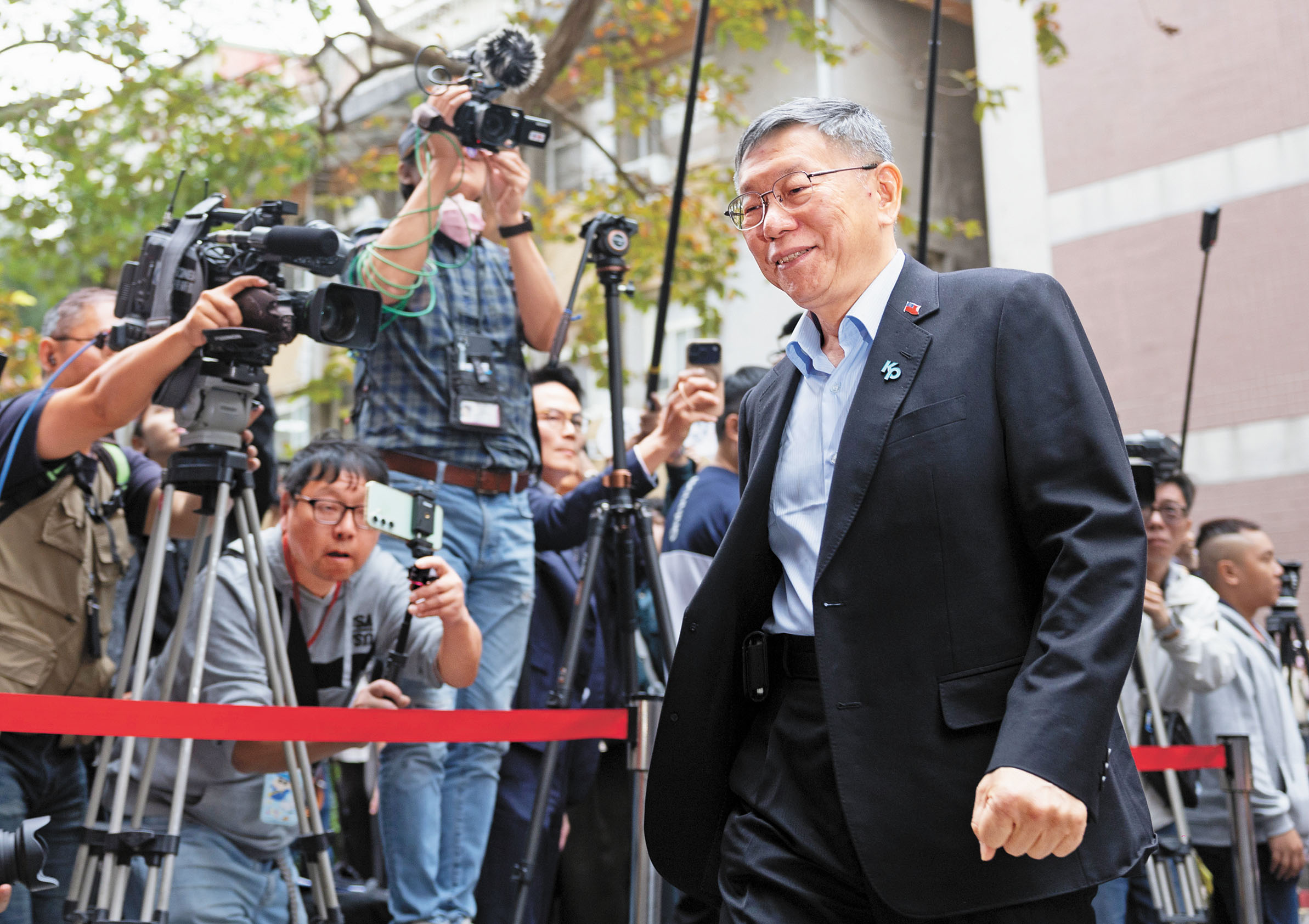 柯文哲臉上帶著微笑。中央社