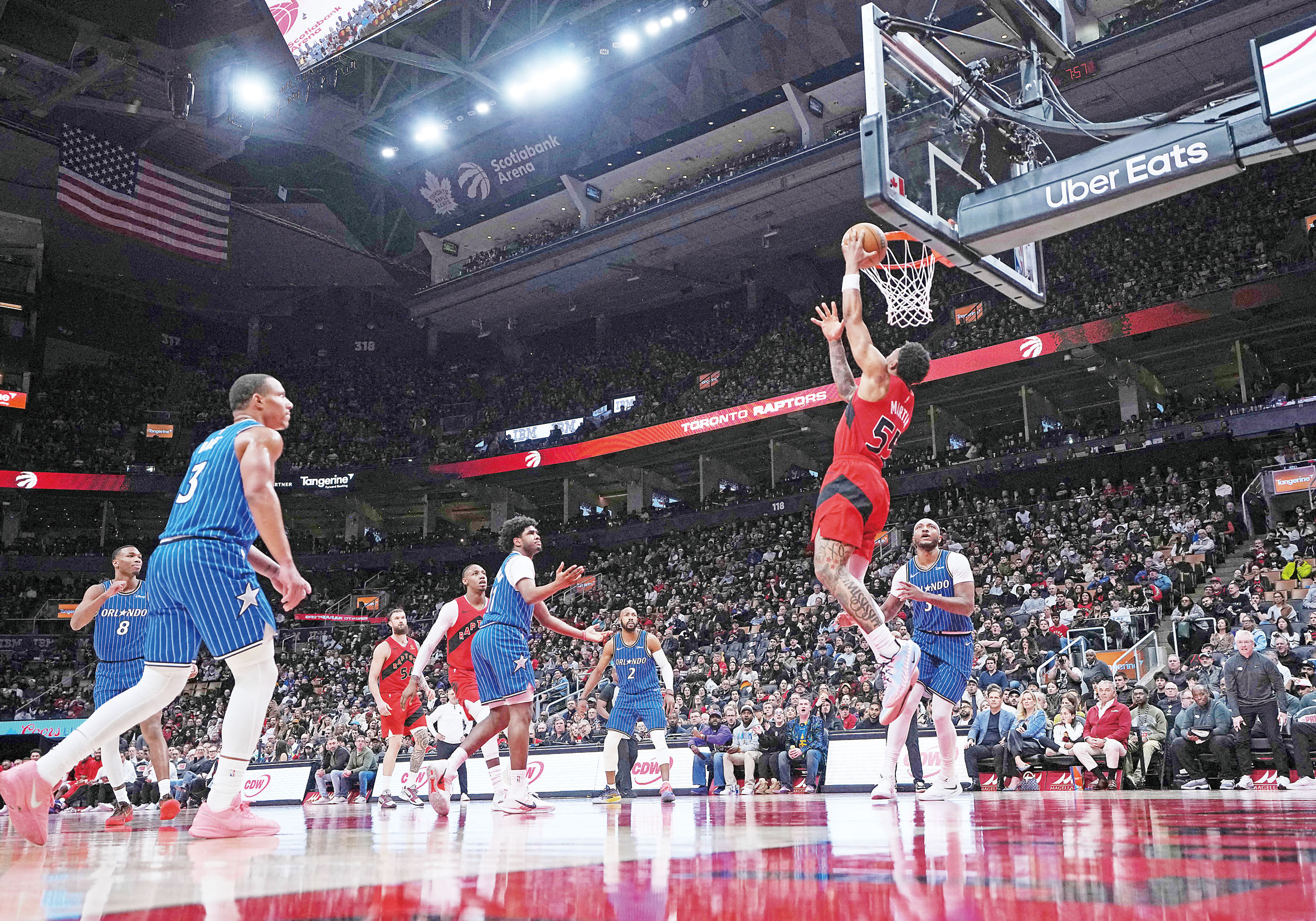 速龍球員開啟得分狂潮,魔術球員無能為力。路透社