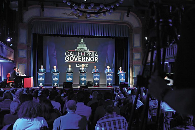 圖為多位州長候選人早前出席辯論會。美聯社資料圖片