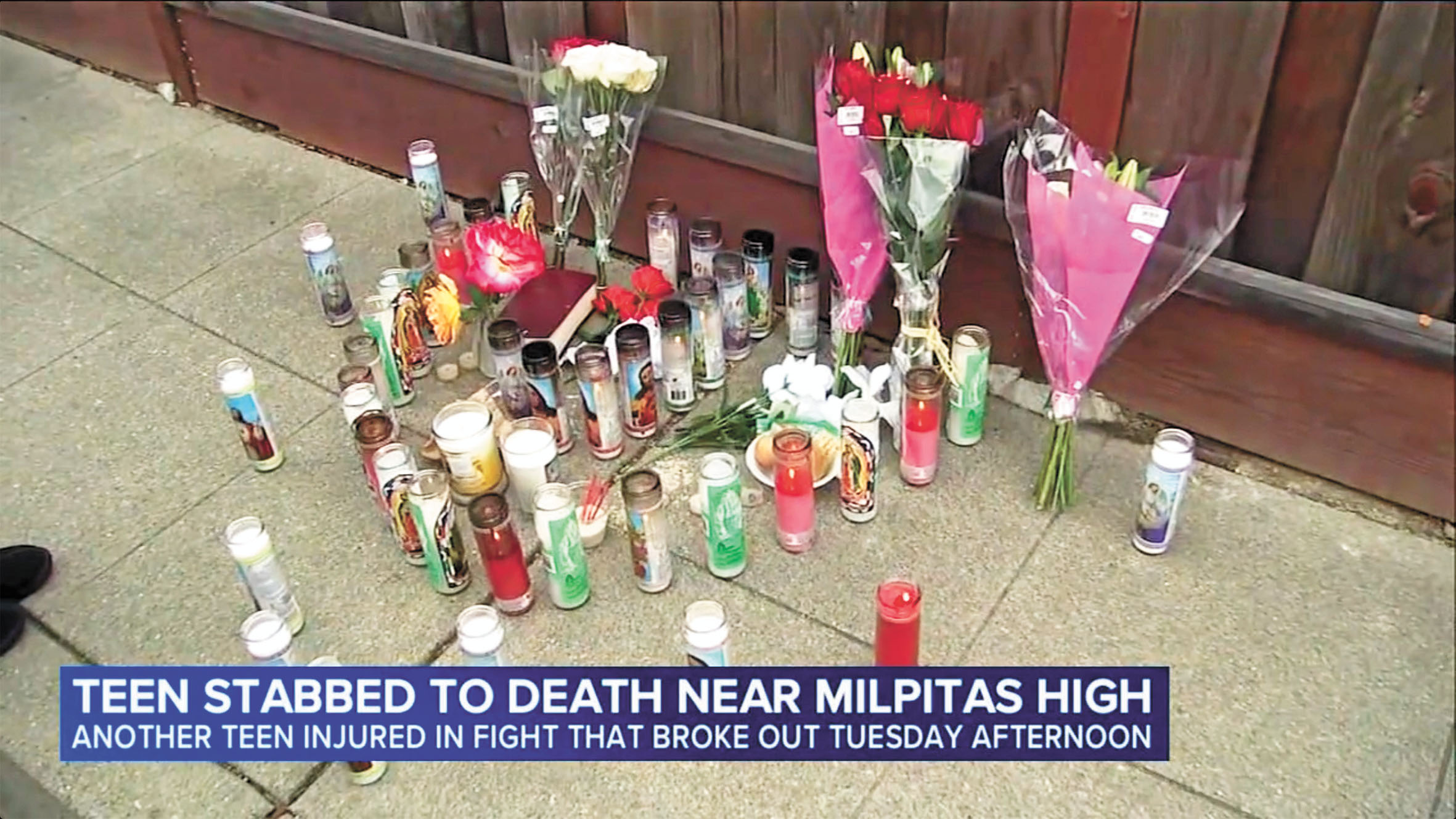 死者親友在案發現場悼念。ABC7電視畫面