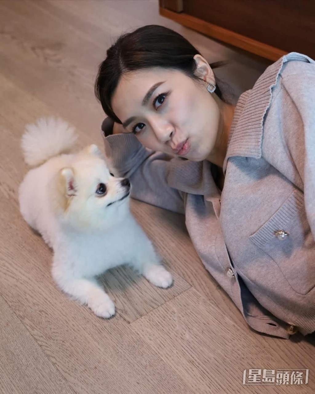 黃智雯把自己的愛犬當作主人般看待。