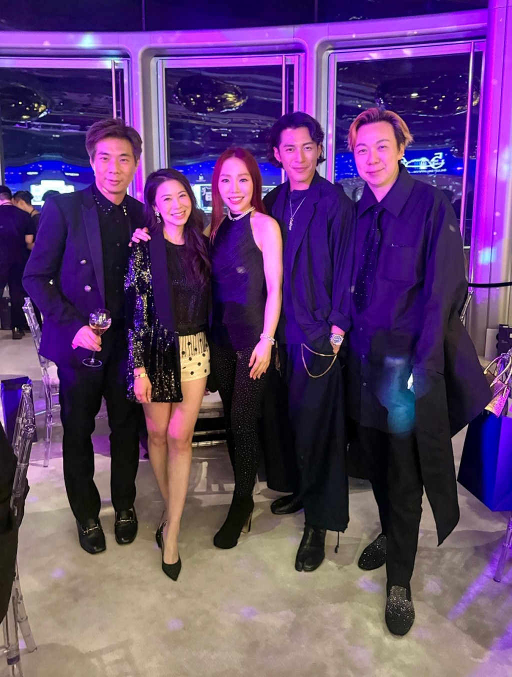 雲文子與模特兒黃俊豪（右二）在活動中合照。