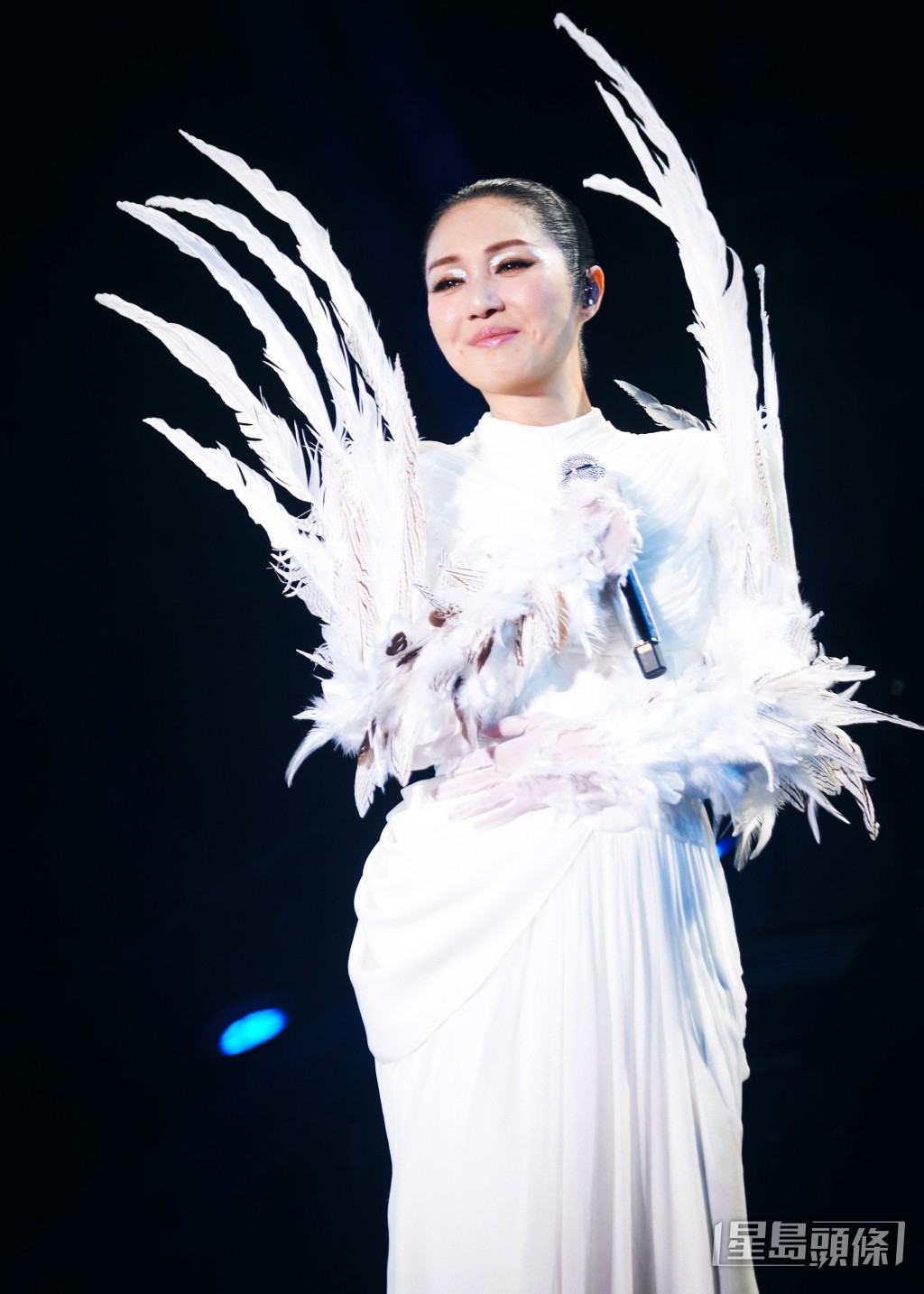 楊千嬅臉上露出滿足的笑容。