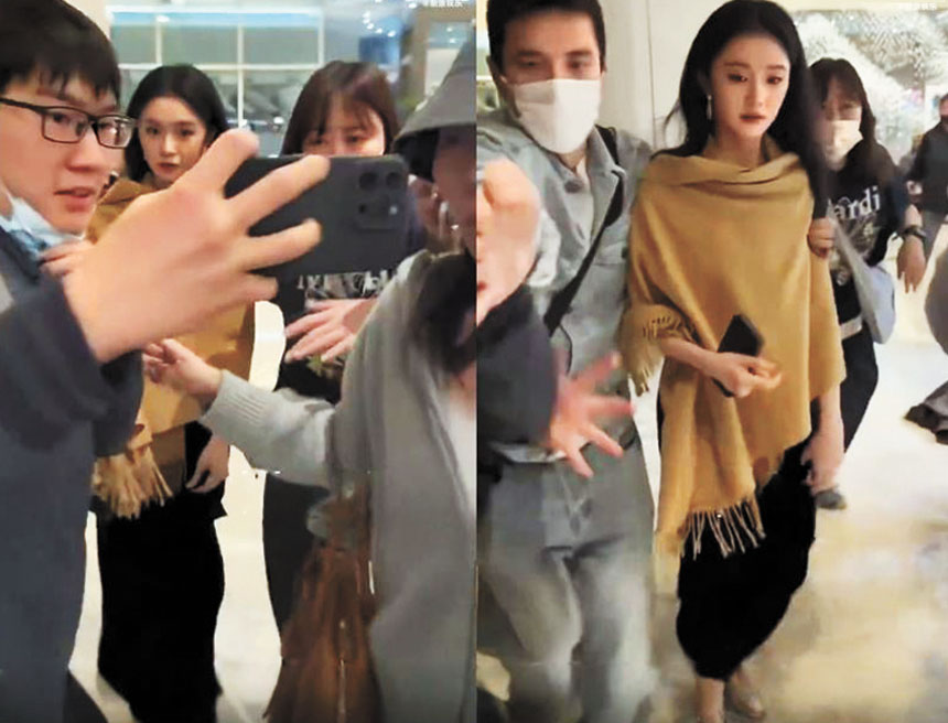 ■戴眼鏡的男子強行貼近劉浩存合照。網上圖片