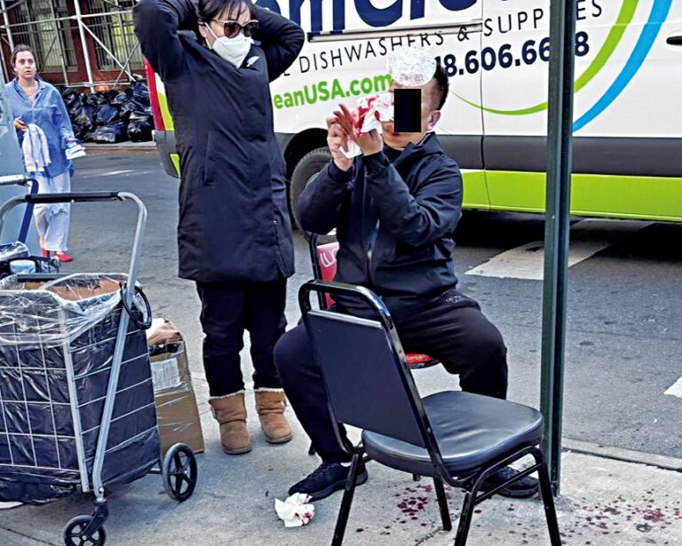 閩籍潘姓小販協助見義勇為的聶先生，他被打到血流披面。