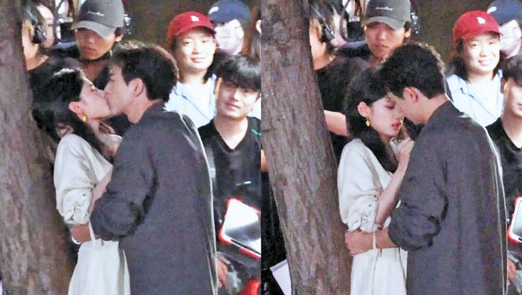 ■張婧儀與李現拍吻戲，連工作人員都看入迷了。	網上圖片