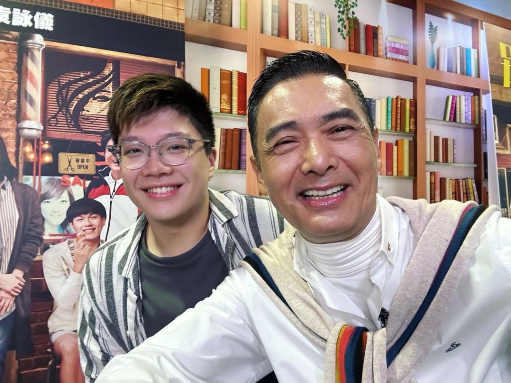 廖文信與周潤發的合照。