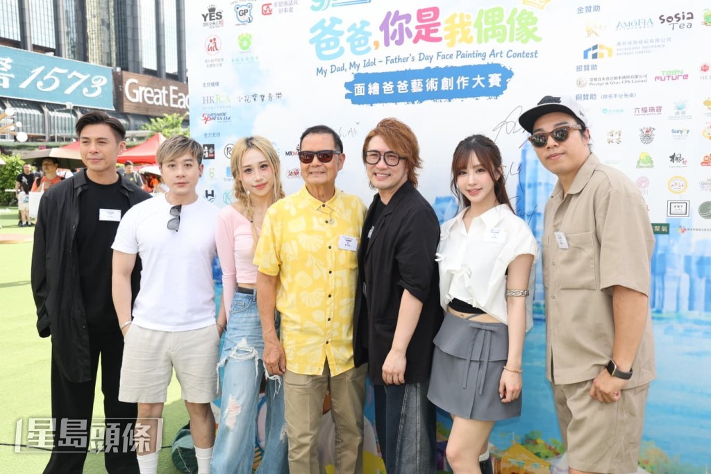 張崇德與吳大強等一同出席在灣仔舉行的父親節活動。