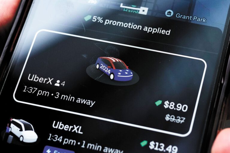 網的巨頭Uber與加州消費者律師協會達成協議，撤回相互競爭的公投提案，圖為手機上展示的Uber程式。美聯社資料圖片
