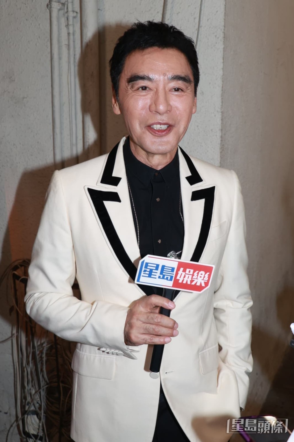 鍾鎮濤與廣東藝術職業學院合作，演唱《讓一切隨風》及《真心英雄》。