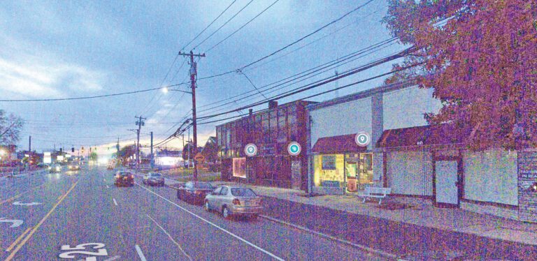 遭警方突擊搜查的按摩店附近街景。