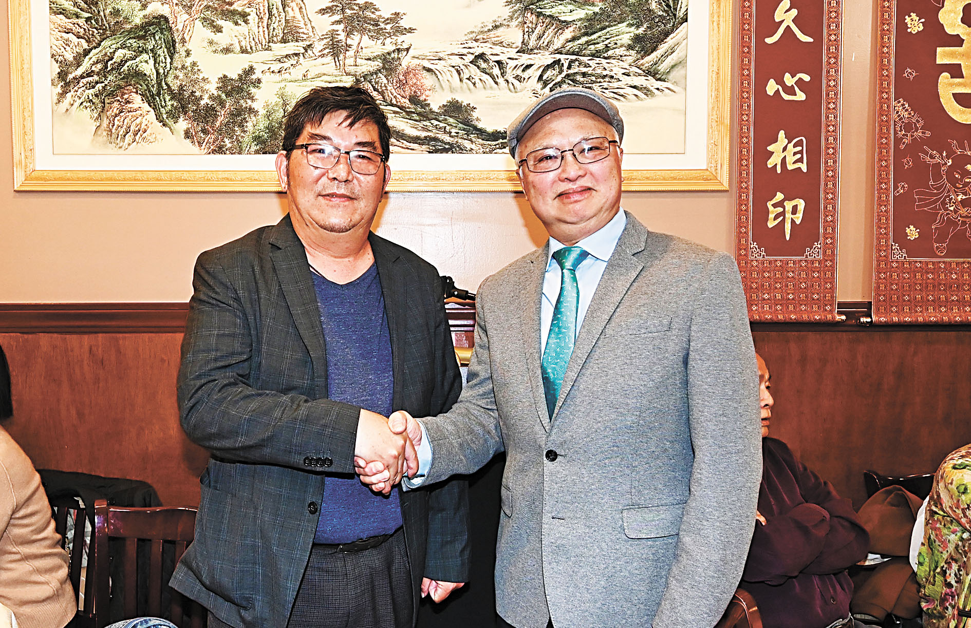 廣福堂主席余健峰、吉鴻雁攜手合作，推展堂務。馬紅兵攝