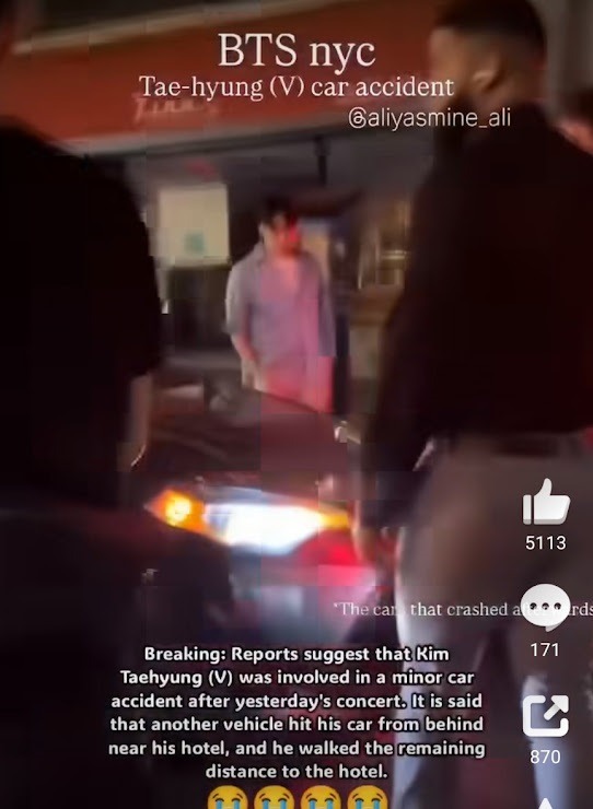 圖中被人群圍觀的灰色房車,疑似是撞到V座駕的車輛。