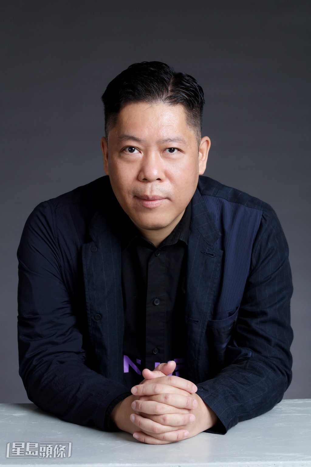 《九龍城寨之終章》出品人陳羅超接受訪問,分享對行業的看法。