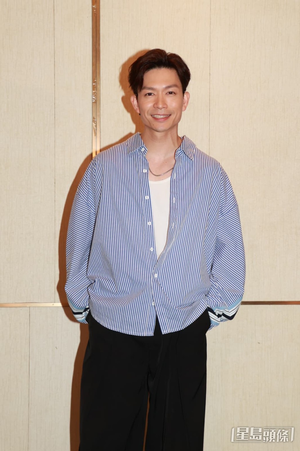 演員周志康。