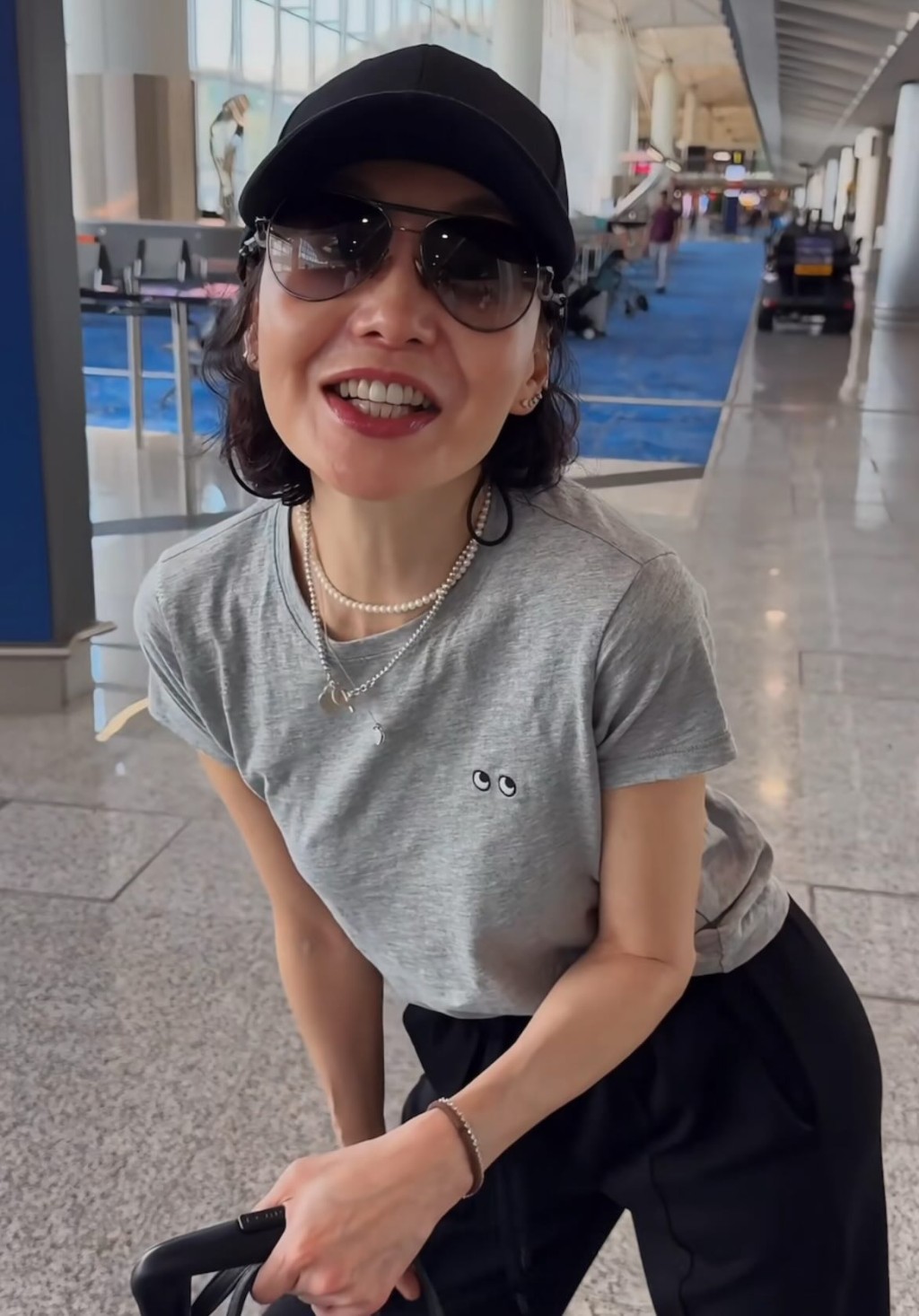 張曼玉的衣著被指與UNIQLO的款式相似。