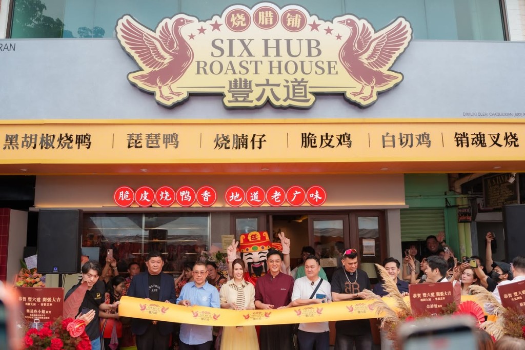 楊明位於馬來西亞的燒味店於十日前開業。
