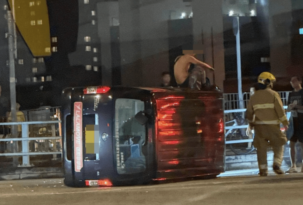 沙田客貨車與的士相撞翻側 司機手部輕傷 冷靜坐車身待援