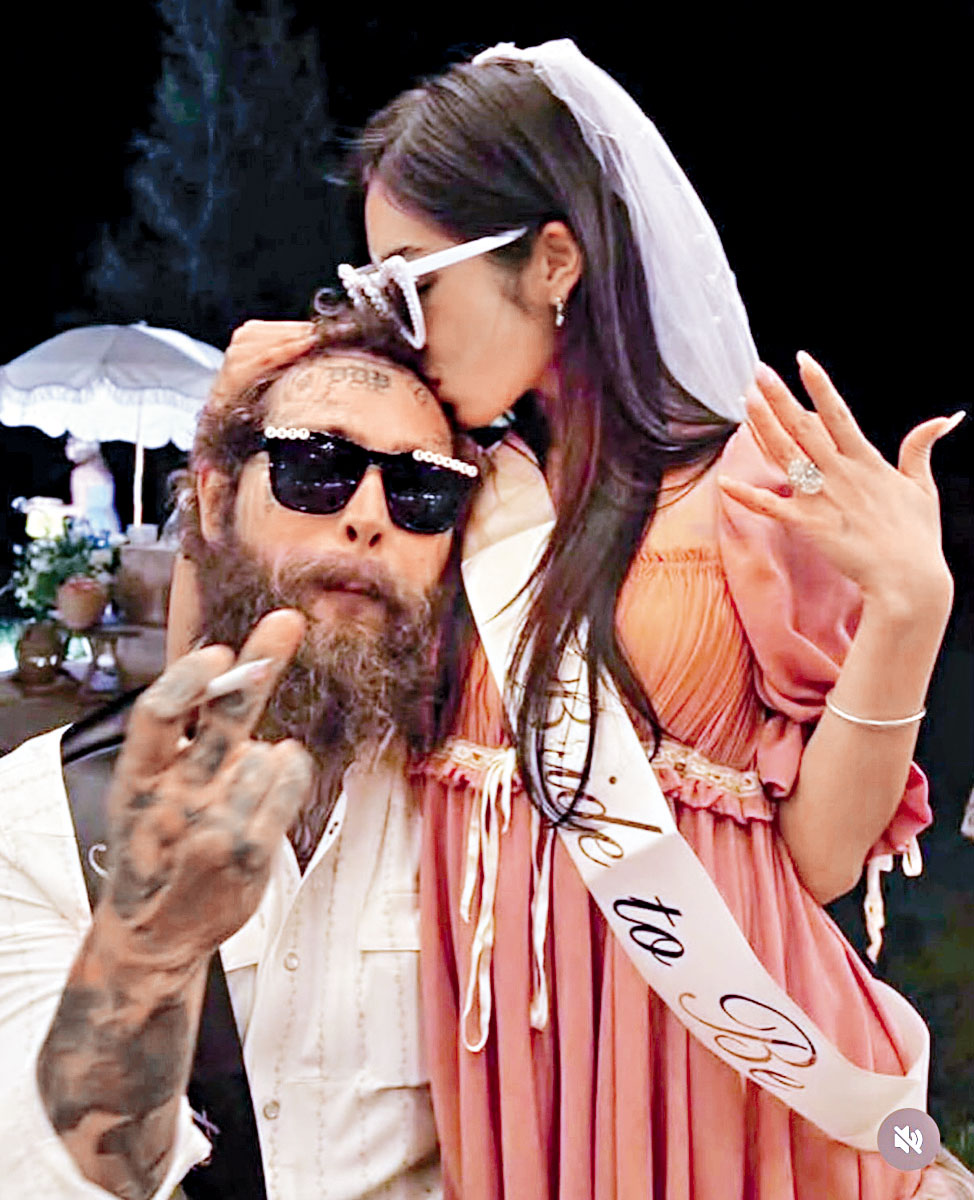 ■日前宣布訂婚的Post Malone，公布香港巡唱延期。網上圖片