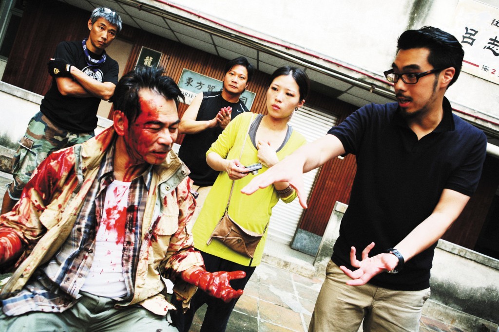 陳觀泰(左)於電影《殺人犯》中的劇照。