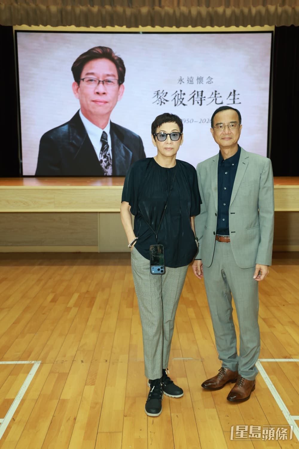 鍾志光與余安安均是黎彼得的生前好友。