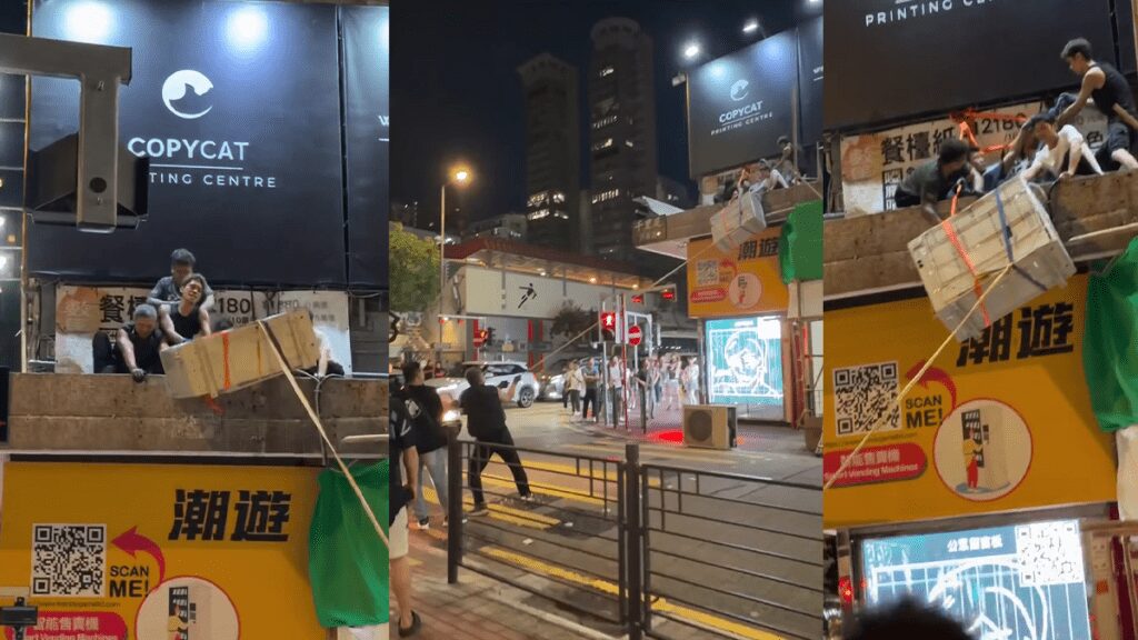 旺角工人徒手吊運冷氣機 安全措施不足引關注