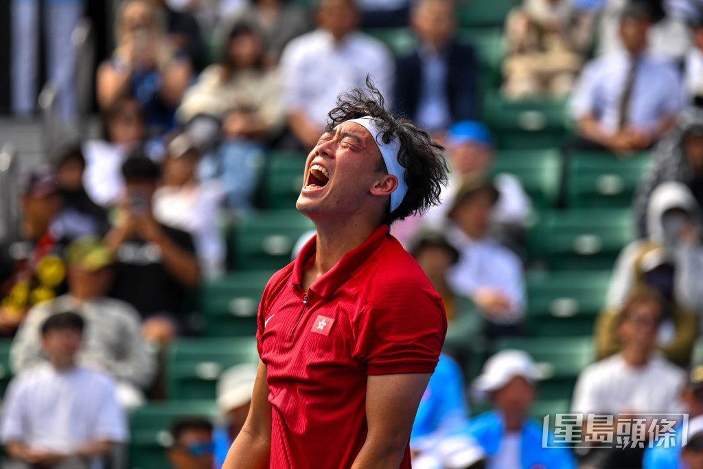 黃澤林為香港隊贏得亞運會首面網球金牌。(劉駿軒攝)