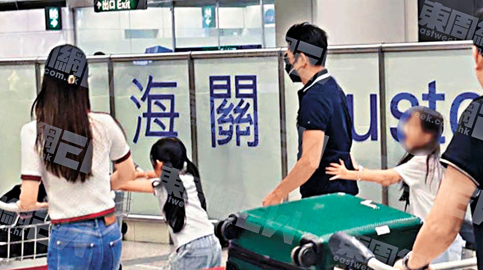 大寶和二寶黐實父母。《東周刊》圖片